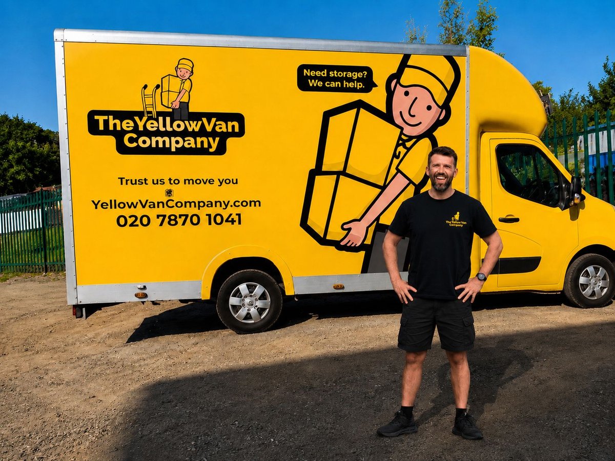 Luke, founder and owner of The Yellow Van Company, standing in front of a branded yellow removals van in London &mdash; family-run London removals company since 2011